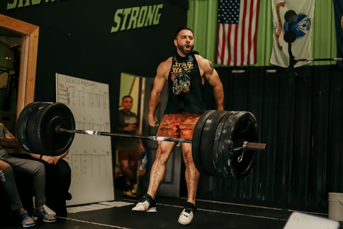 man lifting weights at CrossFit Showdown